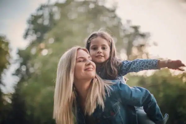 happy mum and daughter following mediation to resolve parental alienation Penzance